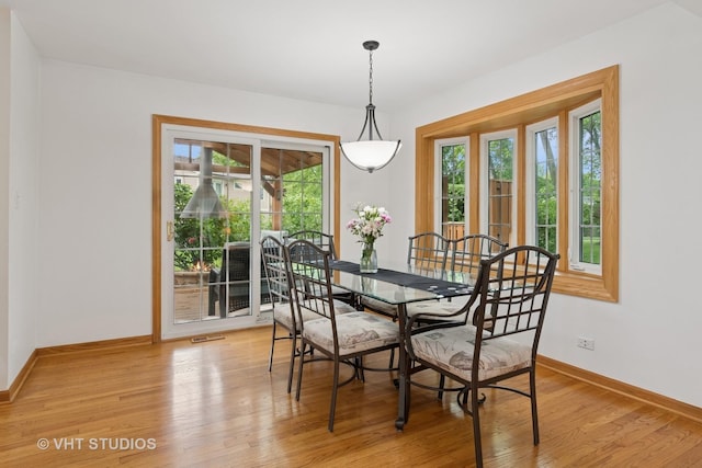 253 Waxwing Ave, Naperville, IL 60565 - dining space with plenty of natural light, baseboards, and light wood finished floors