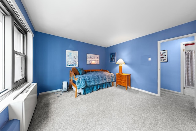 247 E Chestnut St Unit 1102, Chicago, IL 60611 - carpeted bedroom featuring baseboards