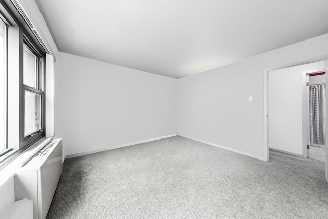 247 E Chestnut St Unit 1102, Chicago, IL 60611 - carpeted spare room with baseboards