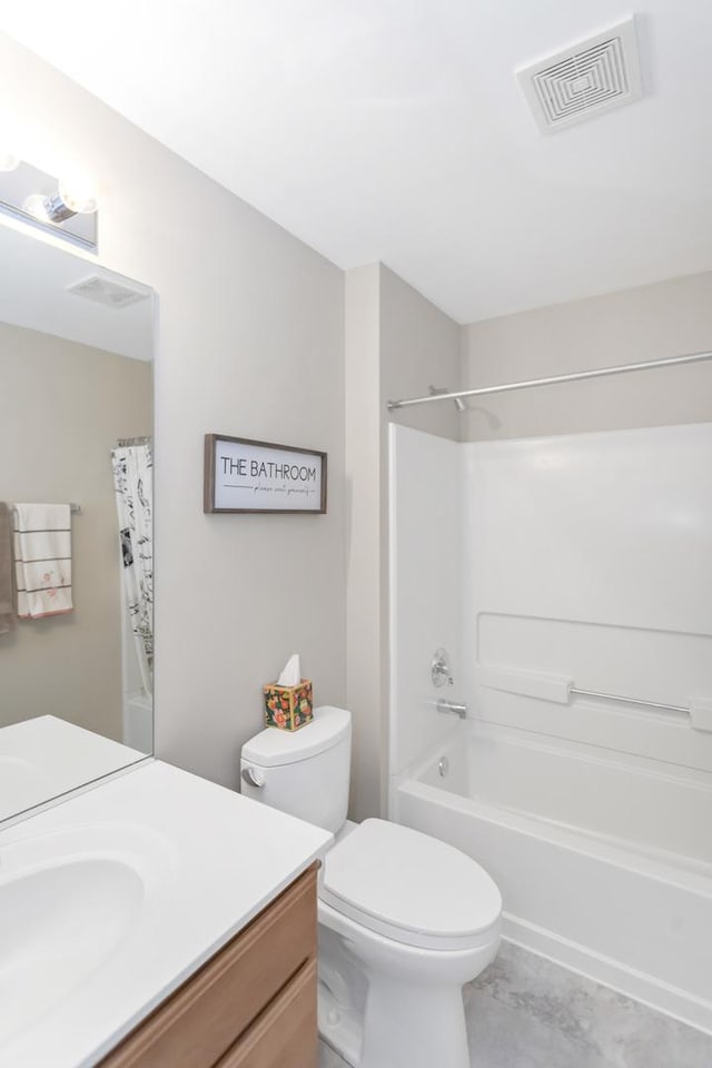 646 S Curran Rd, Round Lake, IL 60073 - bathroom featuring vanity, toilet, and shower / bath combo with shower curtain
