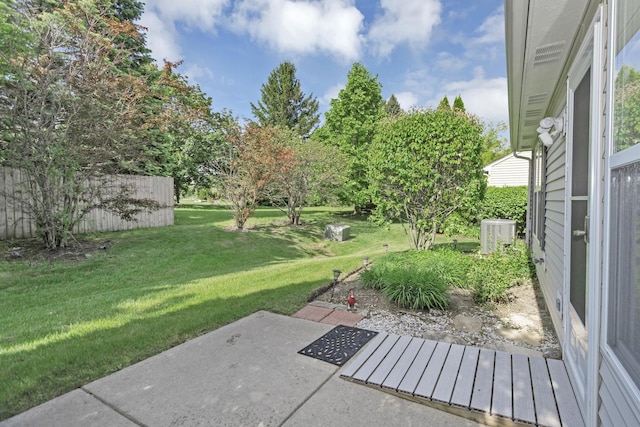 646 S Curran Rd, Round Lake, IL 60073 - view of green lawn with a patio and cooling unit
