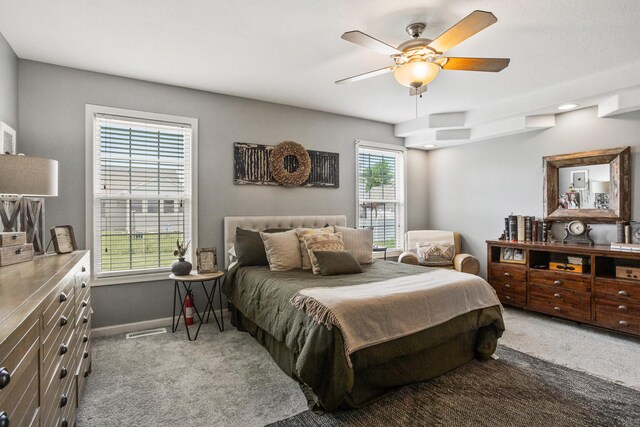 713 Sedgegrass Dr, Champaign, IL 61822 - carpeted bedroom featuring a ceiling fan and baseboards
