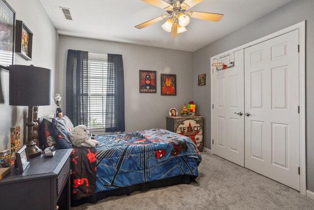 713 Sedgegrass Dr, Champaign, IL 61822 - carpeted bedroom featuring multiple windows, a closet, and ceiling fan