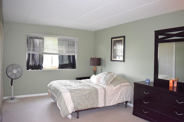 2900 Maple Ave Unit 10E, Downers Grove, IL 60515 - carpeted bedroom featuring baseboards