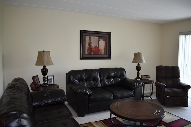 2900 Maple Ave Unit 10E, Downers Grove, IL 60515 - carpeted living room with baseboards