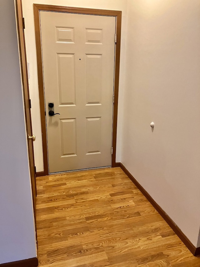 4316 W Shamrock Ln Unit 3C, Mchenry, IL 60050 - hallway with light wood-style floors and baseboards