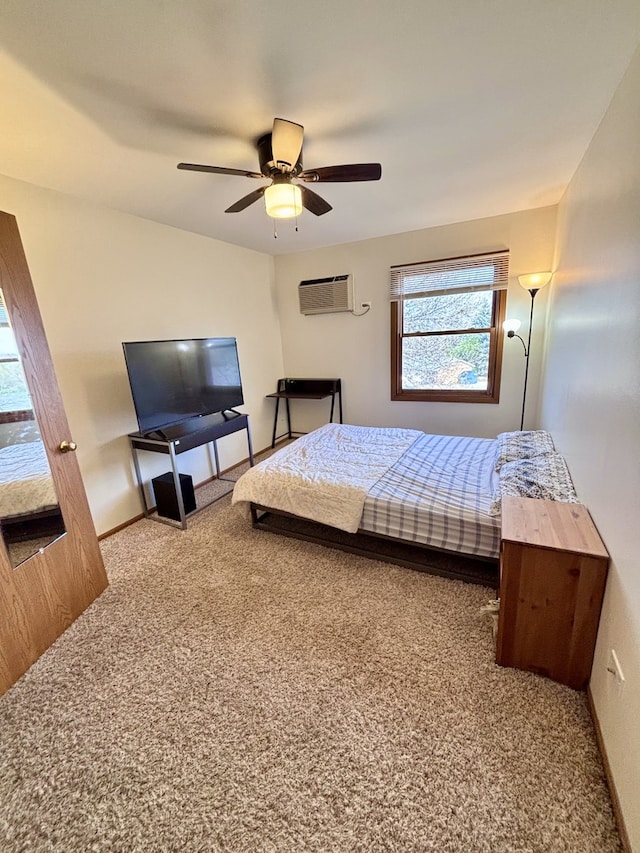 4316 W Shamrock Ln Unit 3C, Mchenry, IL 60050 - carpeted bedroom with a wall unit AC, baseboards, and a ceiling fan