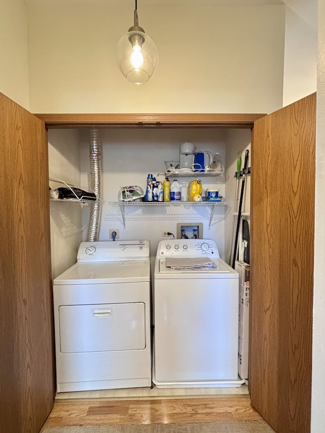 4316 W Shamrock Ln Unit 3C, Mchenry, IL 60050 - washroom with washer and dryer and light wood-type flooring