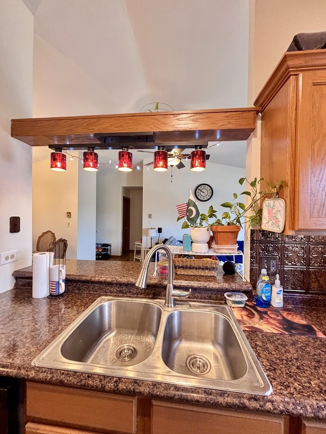 4316 W Shamrock Ln Unit 3C, Mchenry, IL 60050 - kitchen with a sink, ceiling fan, and brown cabinetry