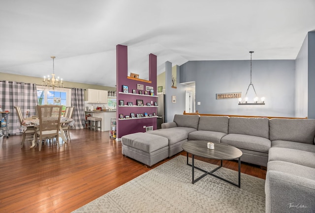 20005 S Mallory Dr, Frankfort, IL 60423 - living area with a chandelier, vaulted ceiling, and wood finished floors