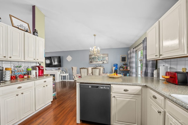 20005 S Mallory Dr, Frankfort, IL 60423 - kitchen with dishwasher, a peninsula, vaulted ceiling, a chandelier, and backsplash