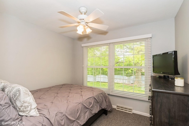 43389 N Oakcrest Ln N, Zion, IL 60099 - bedroom with carpet flooring, baseboards, and ceiling fan