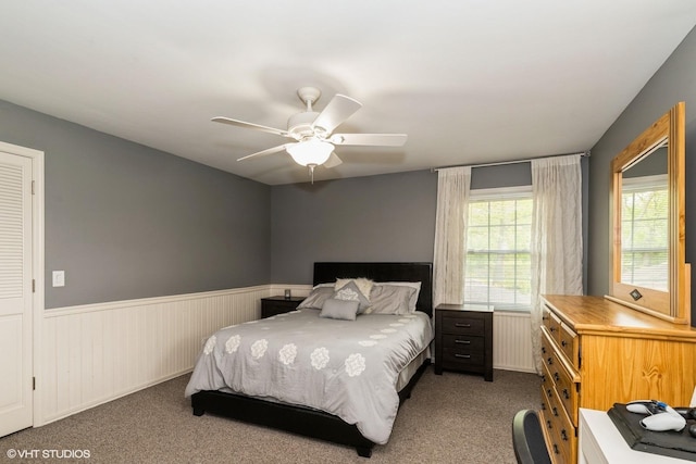 43389 N Oakcrest Ln N, Zion, IL 60099 - carpeted bedroom with wainscoting and a ceiling fan