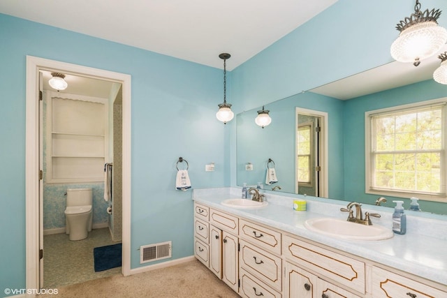 43389 N Oakcrest Ln N, Zion, IL 60099 - full bathroom featuring double vanity and toilet