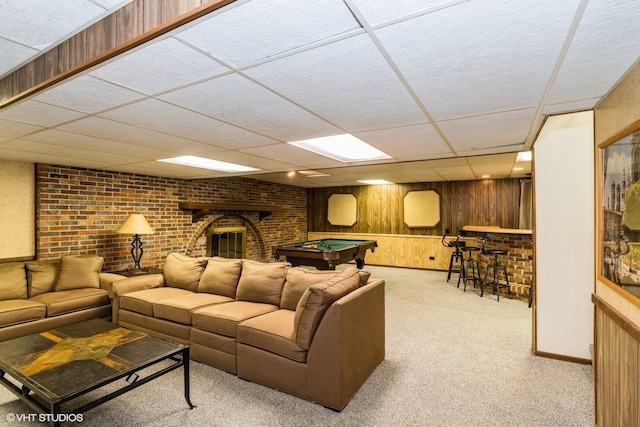 43389 N Oakcrest Ln N, Zion, IL 60099 - carpeted living room with billiards, a bar, wooden walls, and a drop ceiling
