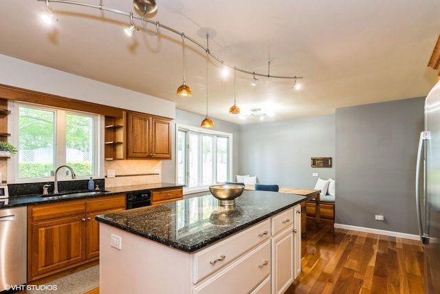 43389 N Oakcrest Ln N, Zion, IL 60099 - kitchen with open shelves, a sink, appliances with stainless steel finishes, rail lighting, and dark wood-style flooring