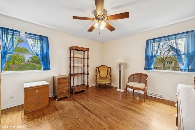 211 W Kenilworth Ave, Prospect Heights, IL 60070 - sitting room with healthy amount of natural light, a ceiling fan, light wood-style floors, and baseboards