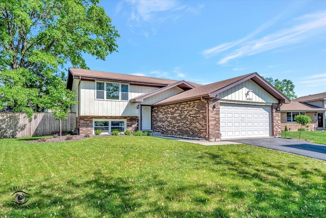 14642 S Cricketwood Ct, Homer Glen, IL 60491 - tri-level home with a garage, brick siding, and asphalt driveway