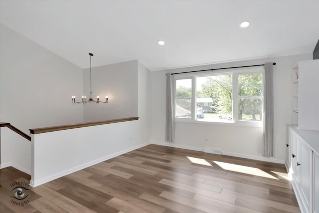 14642 S Cricketwood Ct, Homer Glen, IL 60491 - unfurnished dining area featuring a chandelier, wood finished floors, baseboards, and recessed lighting