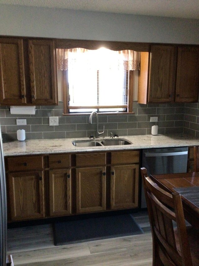 19533 Lake Shore Dr Unit 3N, Lynwood, IL 60411 - kitchen featuring a sink, dishwasher, tasteful backsplash, and wood finished floors