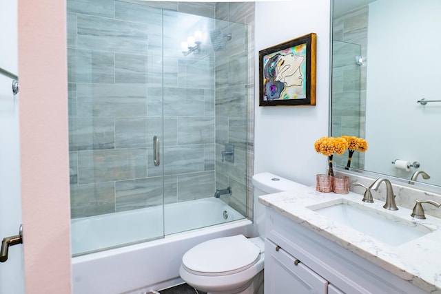 1009 Lathrop Ave, Forest Park, IL 60130 - bathroom with toilet, vanity, and combined bath / shower with glass door