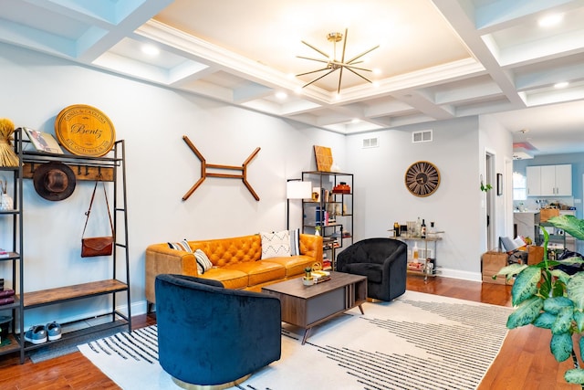 1009 Lathrop Ave, Forest Park, IL 60130 - living room featuring coffered ceiling, wood finished floors, beam ceiling, a chandelier, and baseboards