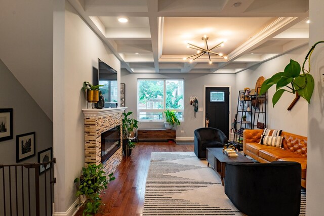 1009 Lathrop Ave, Forest Park, IL 60130 - living area featuring a chandelier, wood finished floors, coffered ceiling, a fireplace, and beam ceiling