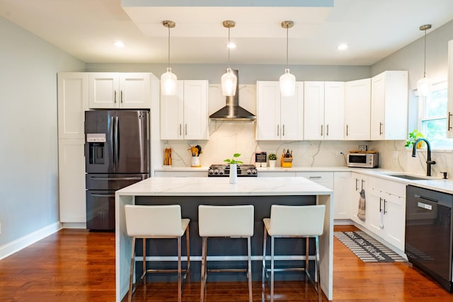 1009 Lathrop Ave, Forest Park, IL 60130 - kitchen featuring fridge with ice dispenser, dishwashing machine, wall chimney exhaust hood, a sink, and a breakfast bar