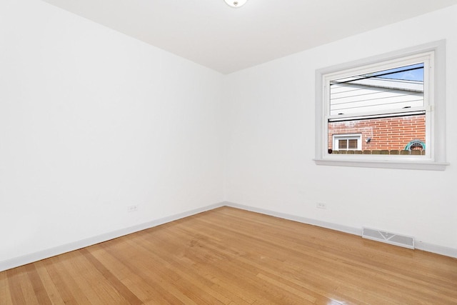 151 Amy St, Chicago Heights, IL 60411 - spare room with light wood-style flooring and baseboards