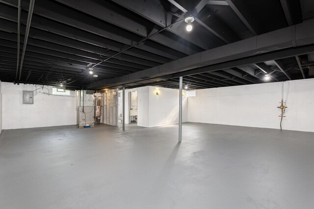 151 Amy St, Chicago Heights, IL 60411 - below grade area featuring electric panel and water heater
