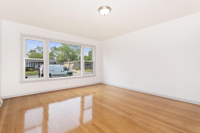 151 Amy St, Chicago Heights, IL 60411 - spare room featuring hardwood / wood-style flooring and baseboards