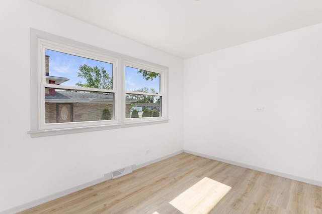 151 Amy St, Chicago Heights, IL 60411 - unfurnished room with wood finished floors and baseboards