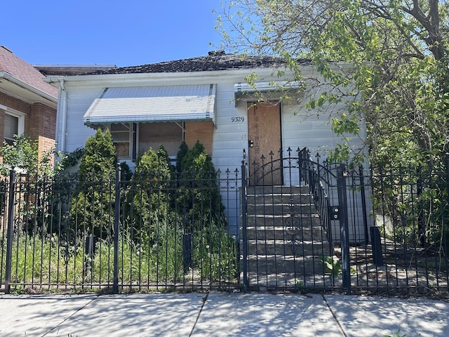 9329 S Wentworth Ave, Chicago, IL 60620 - view of front of house featuring a fenced front yard and a gate
