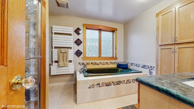 6250 W Holbrook St, Chicago, IL 60646 - bathroom with a bath, vanity, tile patterned floors, and radiator heating unit