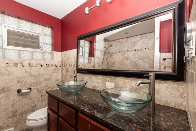 5940 W 88th Pl, Oak Lawn, IL 60453 - full bathroom featuring tile walls, double vanity, and toilet