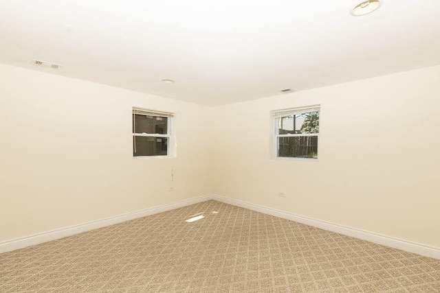 5940 W 88th Pl, Oak Lawn, IL 60453 - empty room featuring baseboards and light carpet