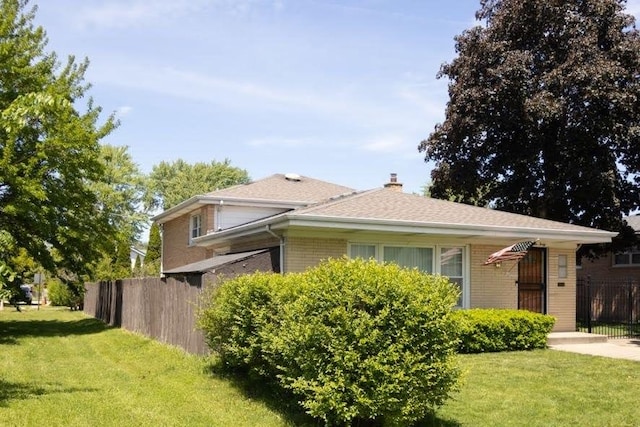 5940 W 88th Pl, Oak Lawn, IL 60453 - view of front of home with brick siding and a chimney