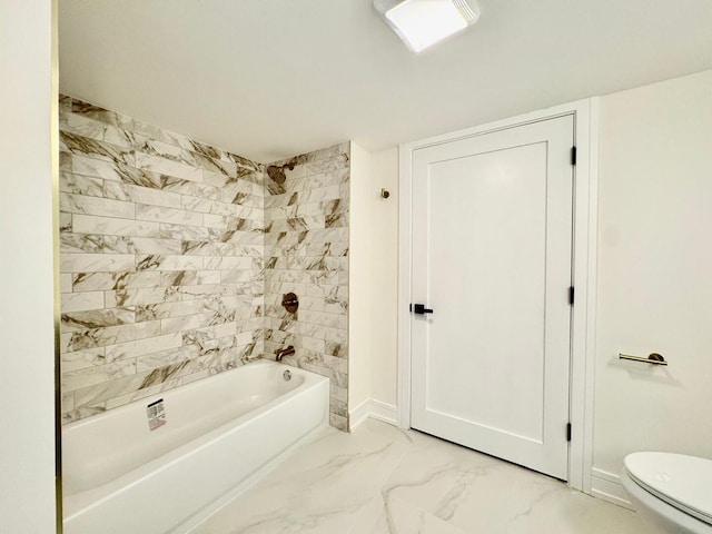 6013 Perry Dr, Woodridge, IL 60517 - full bathroom featuring marble look tiles, toilet, tub / shower combination, and baseboards