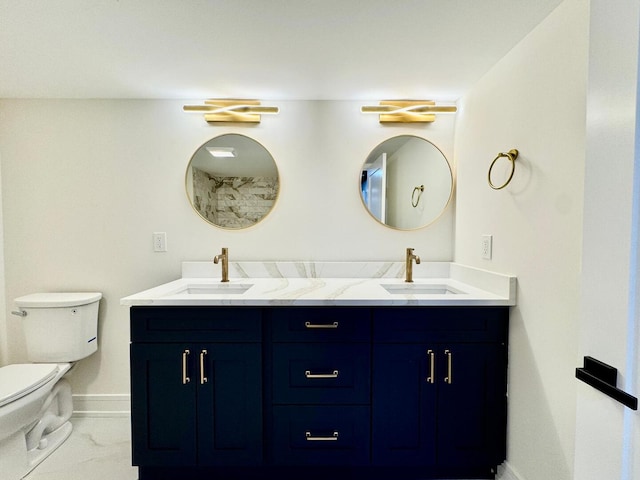 6013 Perry Dr, Woodridge, IL 60517 - bathroom featuring double vanity, toilet, baseboards, and marble finish floors