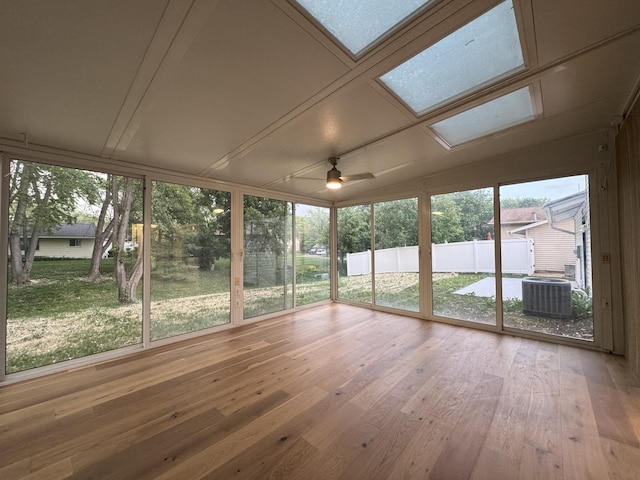 6013 Perry Dr, Woodridge, IL 60517 - unfurnished sunroom with hardwood / wood-style flooring and a ceiling fan