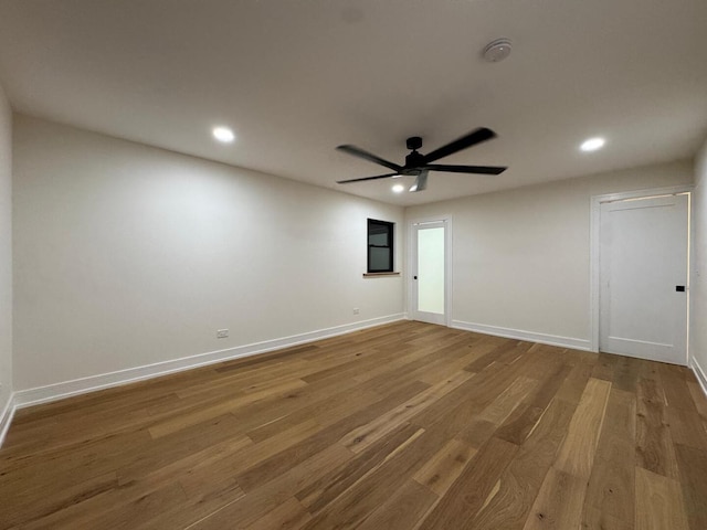 6013 Perry Dr, Woodridge, IL 60517 - spare room with wood finished floors, recessed lighting, ceiling fan, and baseboards