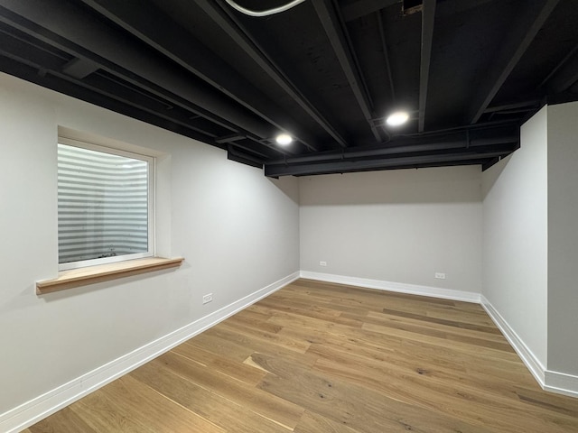 6013 Perry Dr, Woodridge, IL 60517 - finished below grade area featuring baseboards and wood finished floors