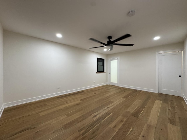 6013 Perry Dr, Woodridge, IL 60517 - spare room featuring recessed lighting, a ceiling fan, wood finished floors, baseboards, and a smoke detector