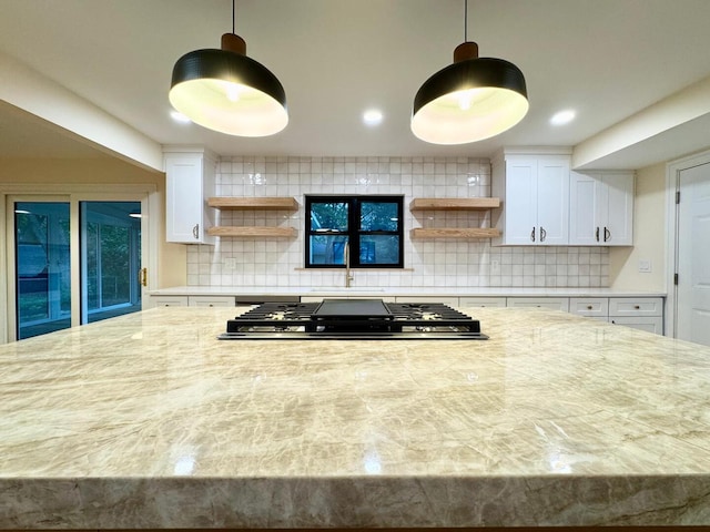 6013 Perry Dr, Woodridge, IL 60517 - kitchen featuring open shelves, a sink, stainless steel gas cooktop, white cabinets, and tasteful backsplash