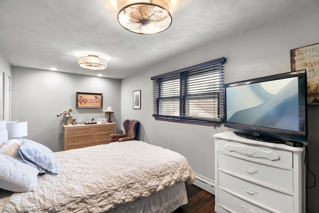 96 E Quincy St, Riverside, IL 60546 - bedroom featuring a baseboard heating unit, dark wood finished floors, and baseboards