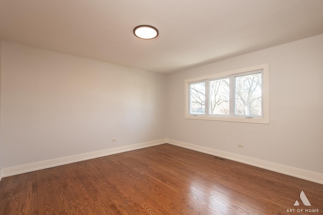 8519 S 82nd Ct, Hickory Hills, IL 60457 - unfurnished room featuring dark wood-style floors and baseboards