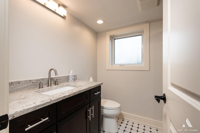 8519 S 82nd Ct, Hickory Hills, IL 60457 - bathroom with toilet, vanity, baseboards, tile patterned floors, and recessed lighting
