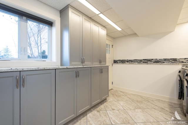 8519 S 82nd Ct, Hickory Hills, IL 60457 - bathroom featuring washer and dryer, a drop ceiling, and baseboards