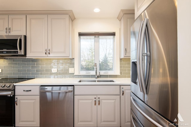8519 S 82nd Ct, Hickory Hills, IL 60457 - kitchen featuring stainless steel appliances, a sink, backsplash, light countertops, and recessed lighting