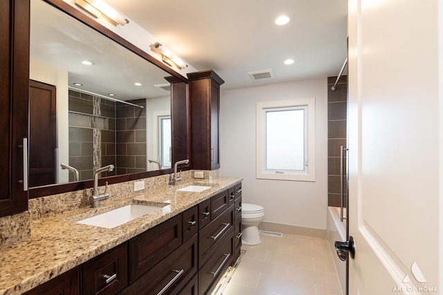 8519 S 82nd Ct, Hickory Hills, IL 60457 - bathroom with double vanity, toilet, tile patterned flooring, recessed lighting, and baseboards